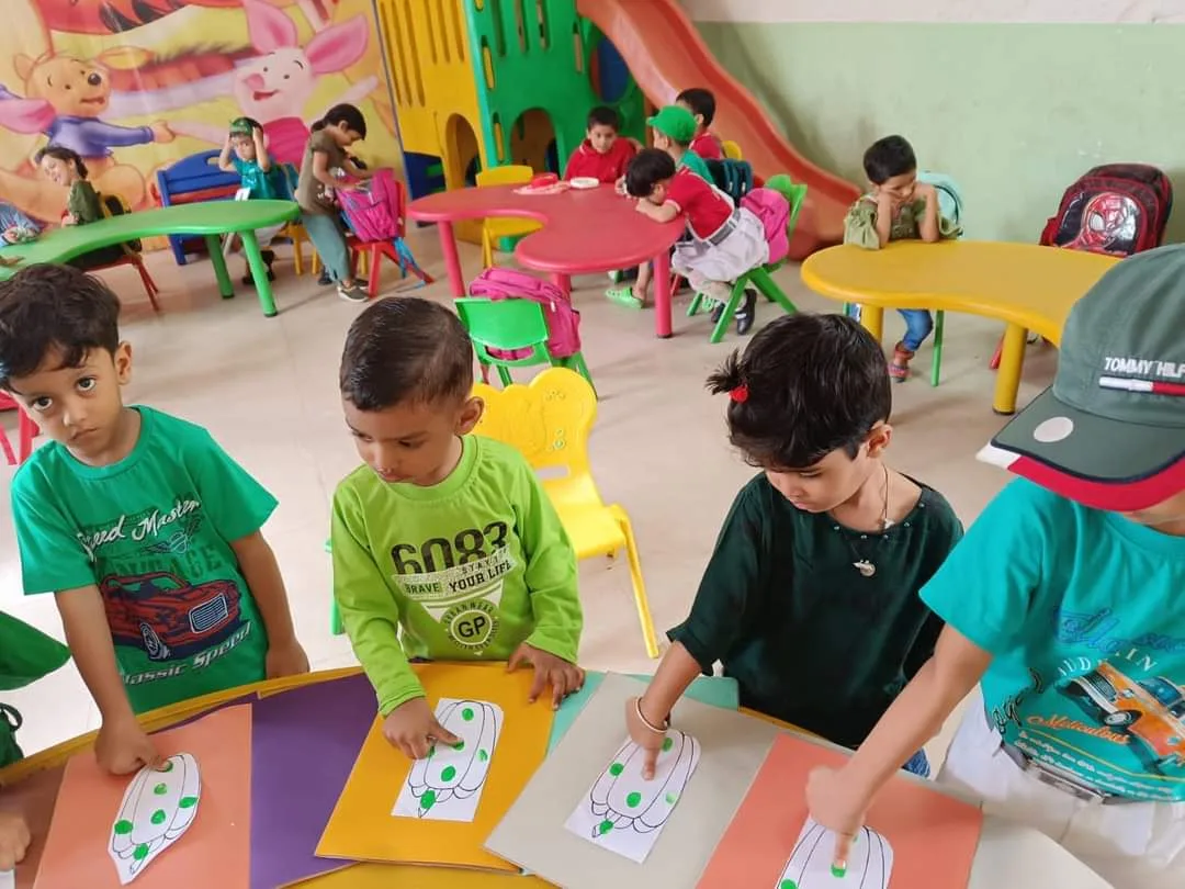 Students doing creative classroom work at SBS Alwar